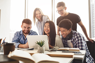 Students Around Laptop